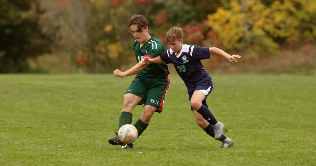 Luke '24 on the soccer field