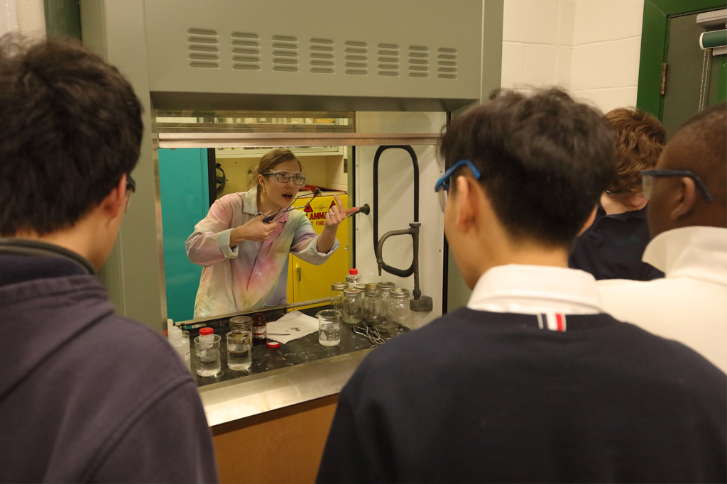 Stephanie Jackman and a Grade 11 Chemistry class