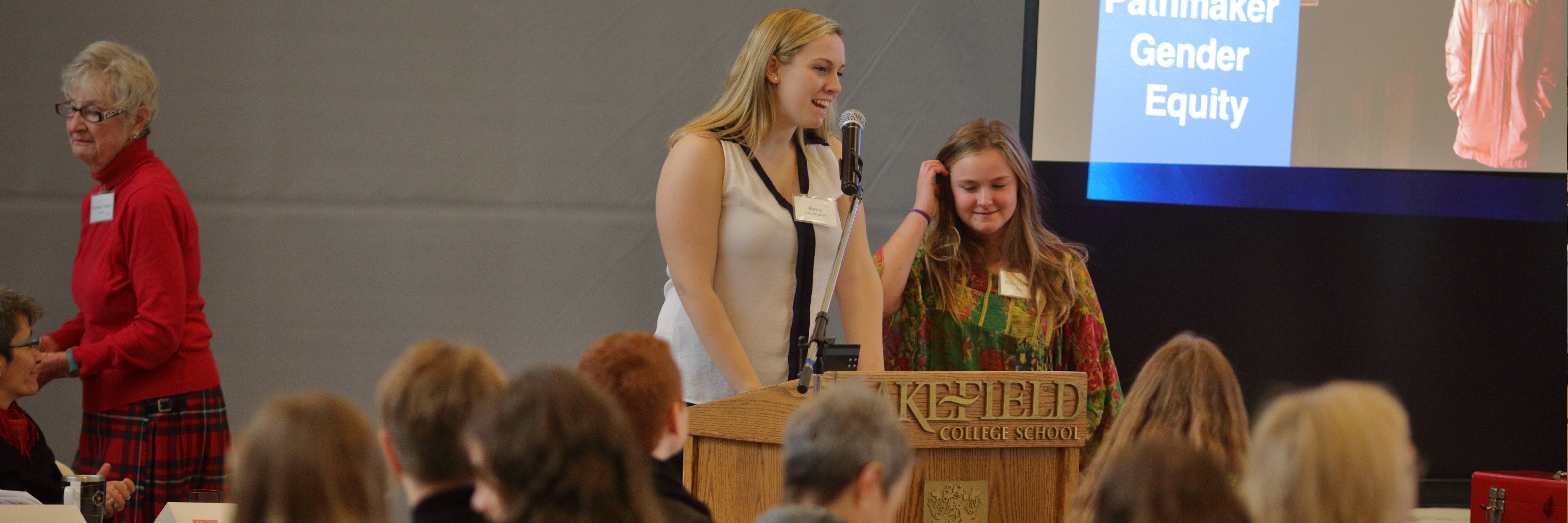 MC Betsy Macdonnel introducing Pathmaker Kaia Douglas 